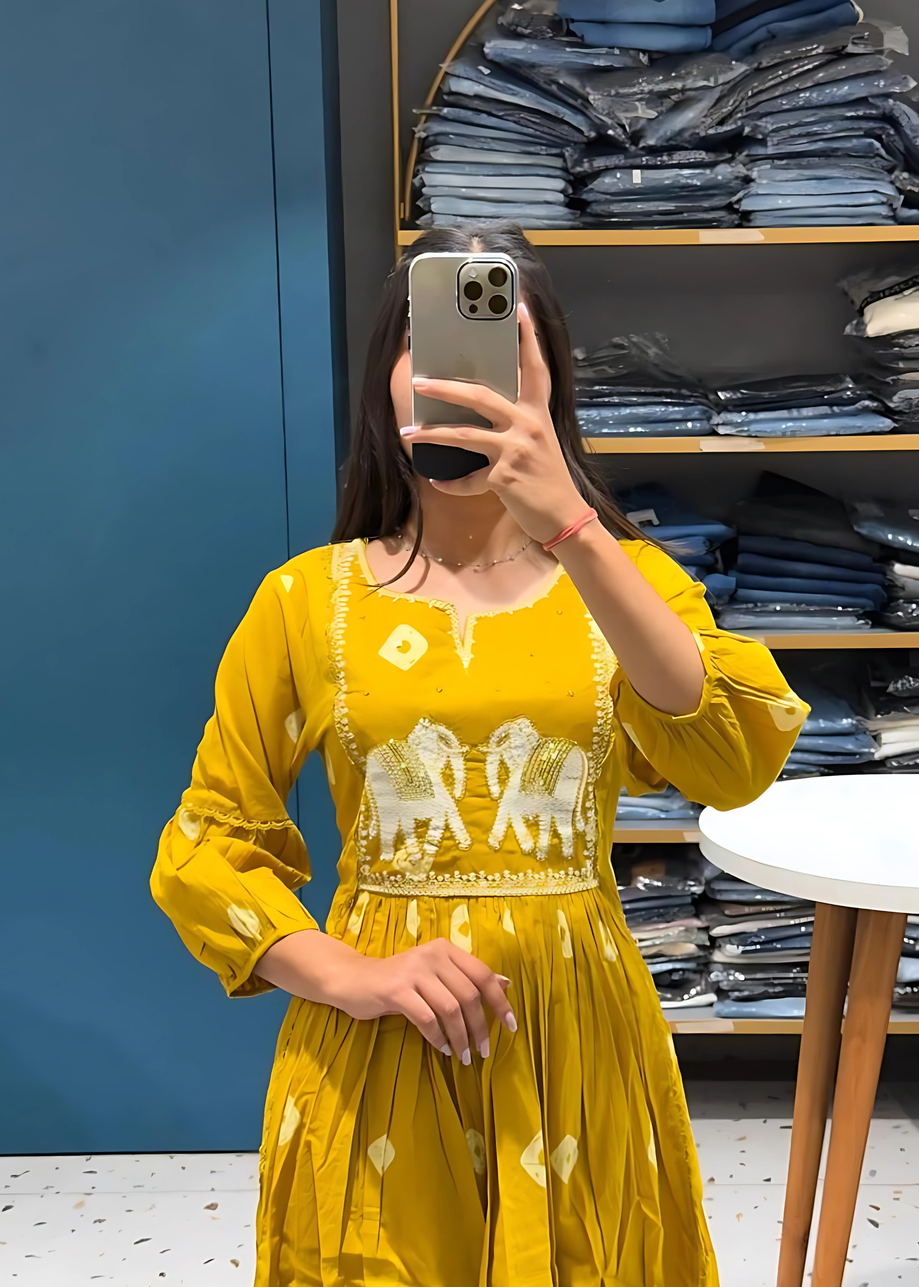 Elegant yellow kurta and pant set featuring intricate elephant embroidery, paired with a matching dupatta for a graceful ethnic look.