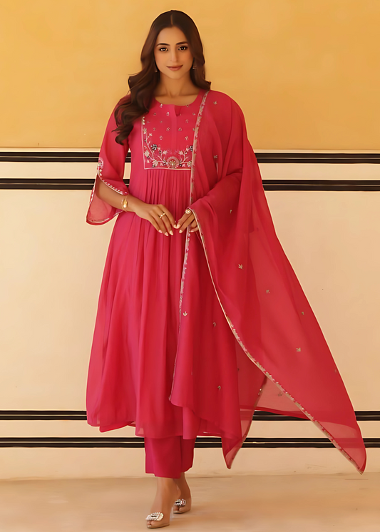 Feminine and flowy pure mul cotton kurta set in vibrant pink, perfect for casual and festive occasions.






