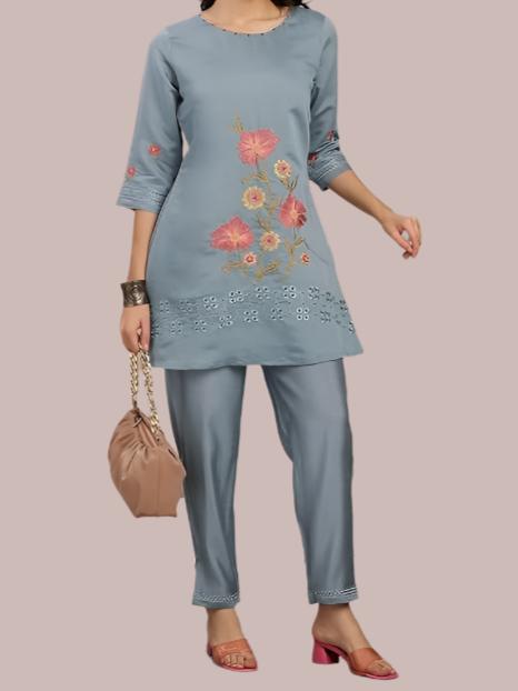 Chic grey embroidered co-ord set with glamorous accents, perfect for festive and party wear.