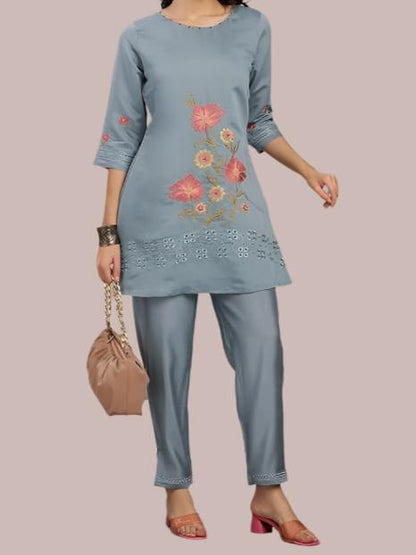 Chic grey embroidered co-ord set with glamorous accents, perfect for festive and party wear.