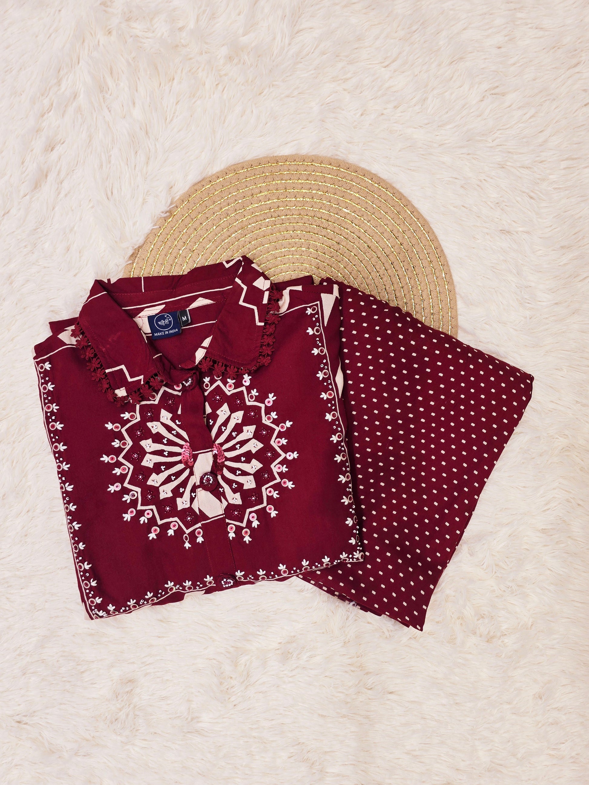 Sophisticated maroon A-line kurta set, perfect for making a statement at celebrations and gatherings.