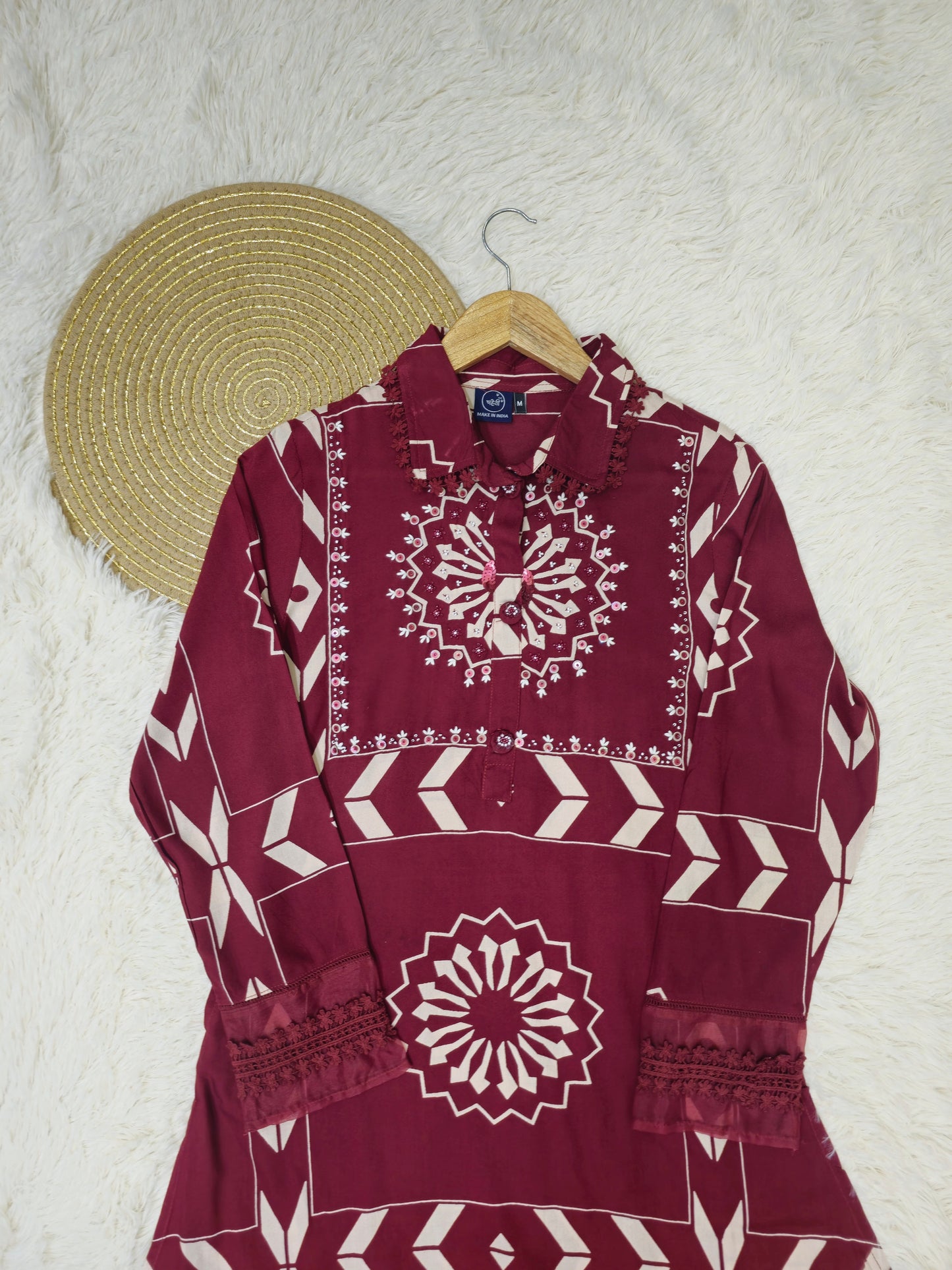 Trendy royal maroon kurta set with a flowy A-line design, offering a refined and graceful appeal.
