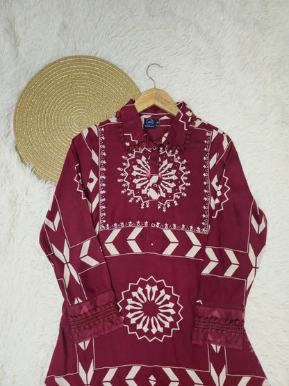 Trendy royal maroon kurta set with a flowy A-line design, offering a refined and graceful appeal.
