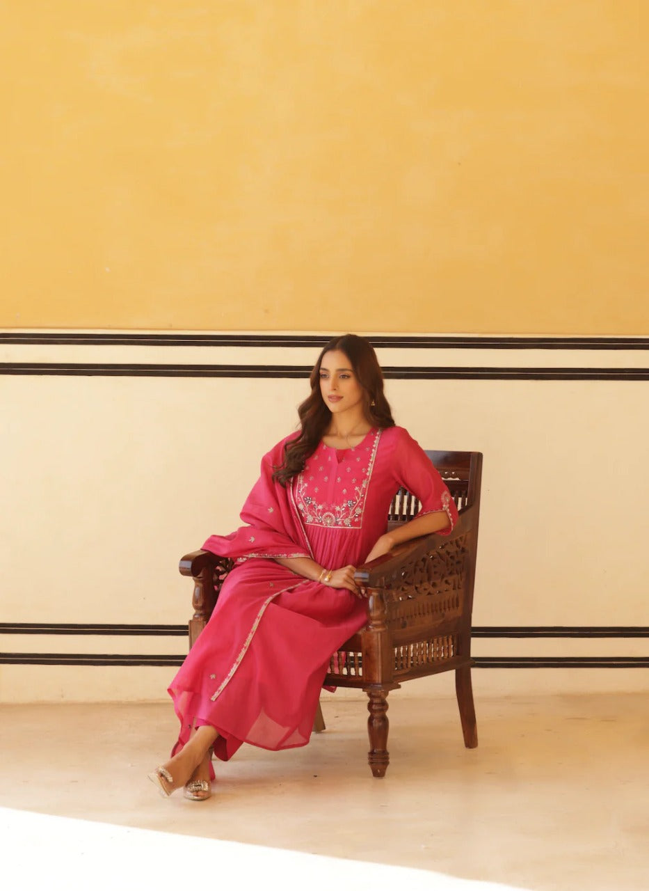 Stylish and lightweight pure mul cotton kurta set in vibrant pink, designed with a flattering flared silhouette.
