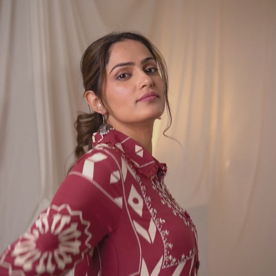 Graceful royal maroon kurta set with a classic A-line cut, blending tradition with modern style.
