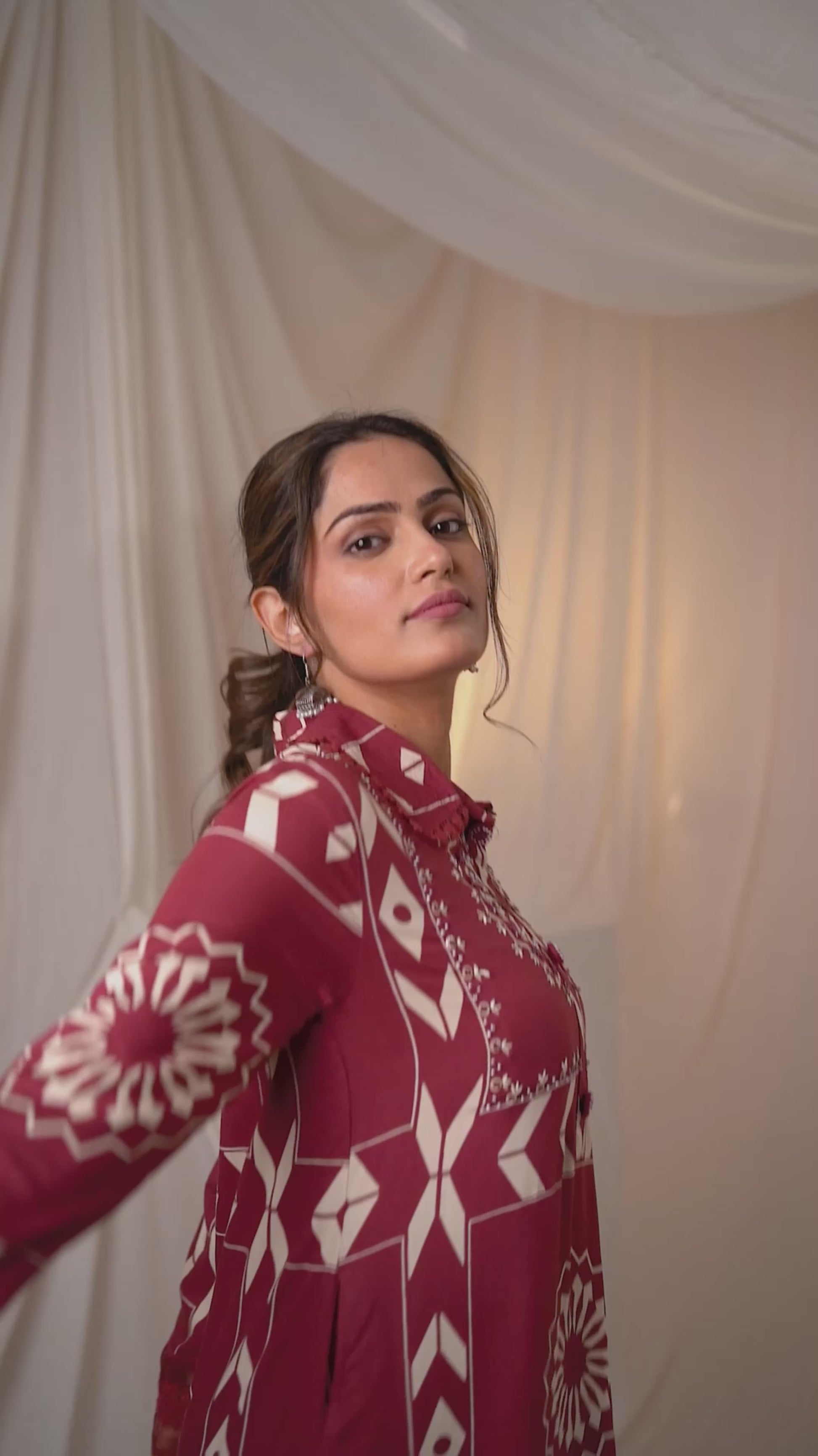 Graceful royal maroon kurta set with a classic A-line cut, blending tradition with modern style.
